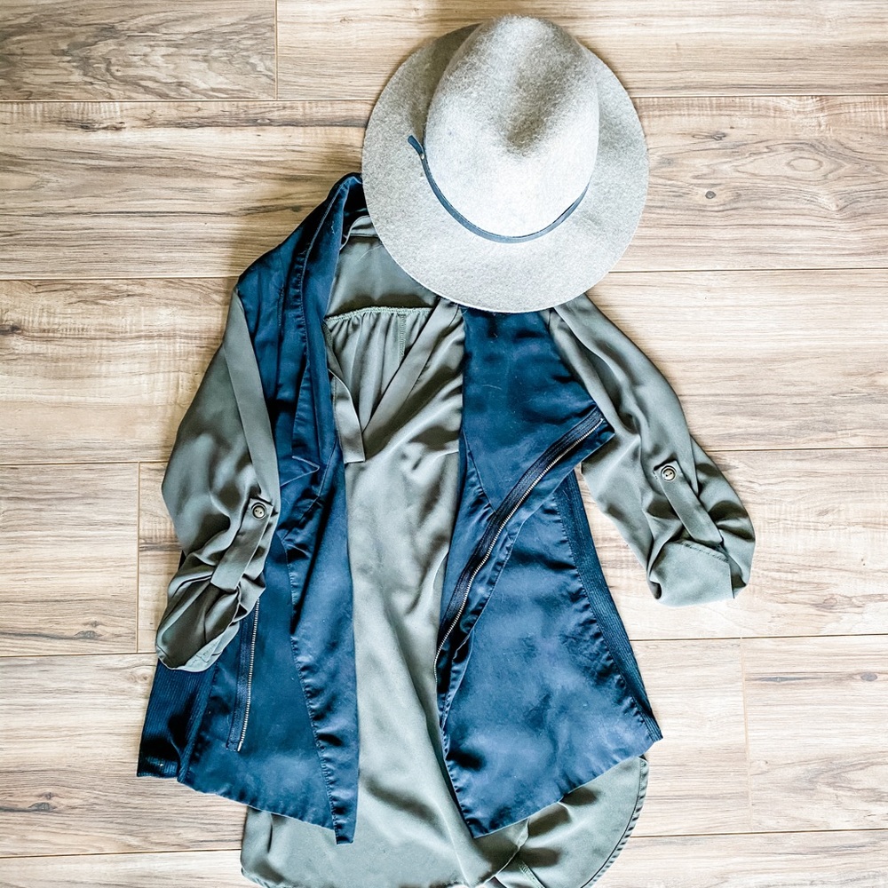 A- symmetrical zip up vest